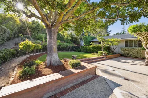 a view of a house with garden