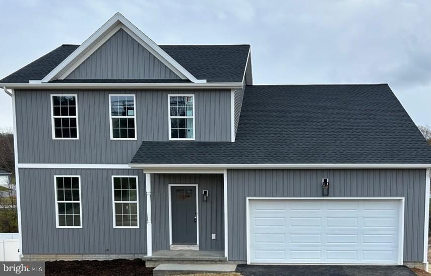 652 Stoverstown Road York, PA 17408 - Photo 1 of 1 a front view of a house with a garage