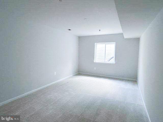 9285 Crestview Rdg Drive Bristow, VA 20136 - Photo 14 of 25 an empty room with a window and a bathroom
