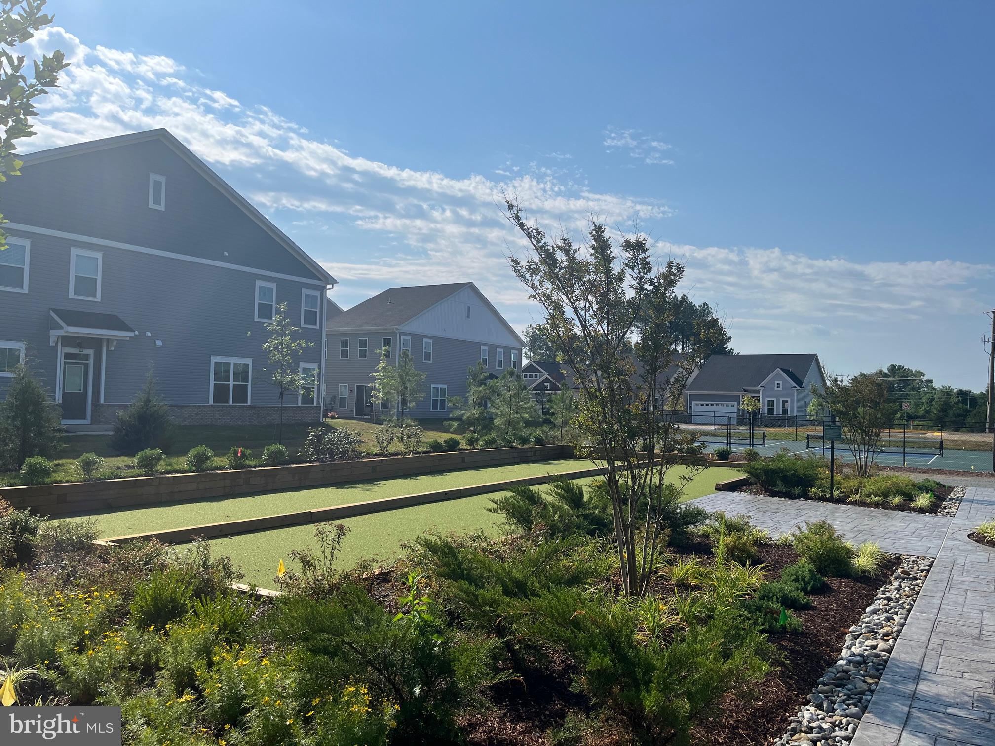 9285 Crestview Rdg Drive Bristow, VA 20136 - Photo 21 of 25 a view of a house with a yard and a large pool