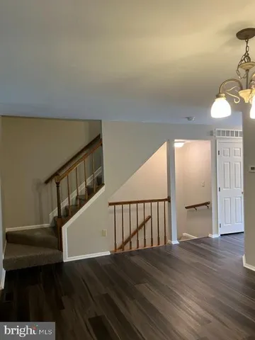a view of wooden floor in an empty room