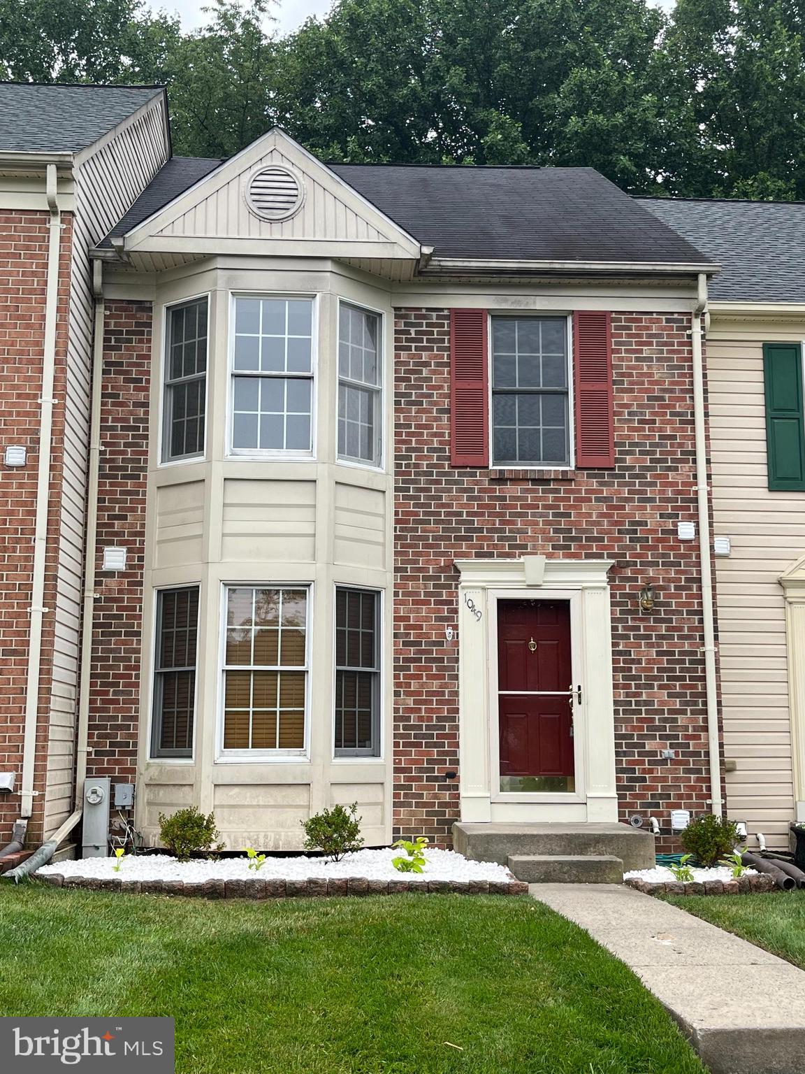 1049 Wingate Court, Unit I14 Bel Air, MD 21014 - Photo 2 of 61 a front view of a house with a yard