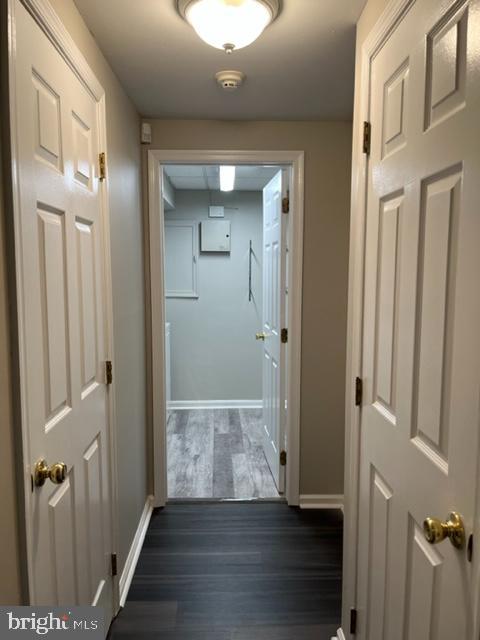 1049 Wingate Court, Unit I14 Bel Air, MD 21014 - Photo 27 of 61 wooden floor with a mirror