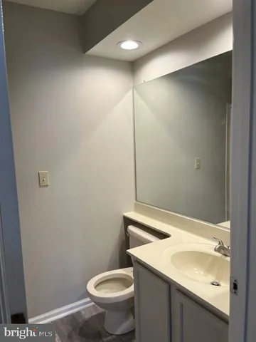a bathroom with a sink toilet and tub