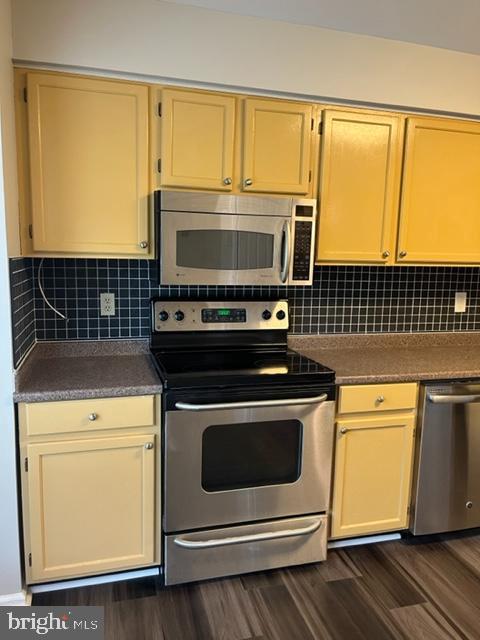1049 Wingate Court, Unit I14 Bel Air, MD 21014 - Photo 7 of 61 a kitchen with a stove and a microwave
