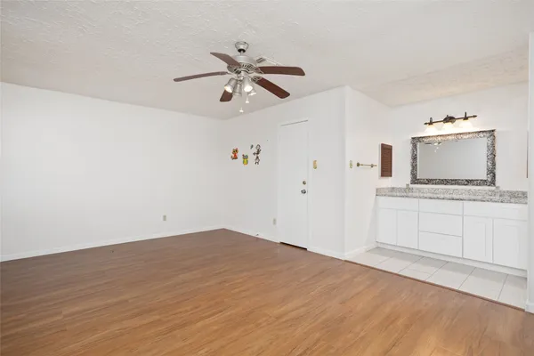 a view of a kitchen with a sink and dishwasher