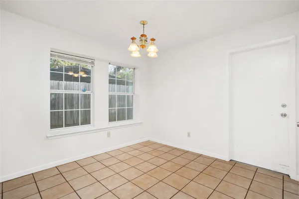 a view of an empty room with window