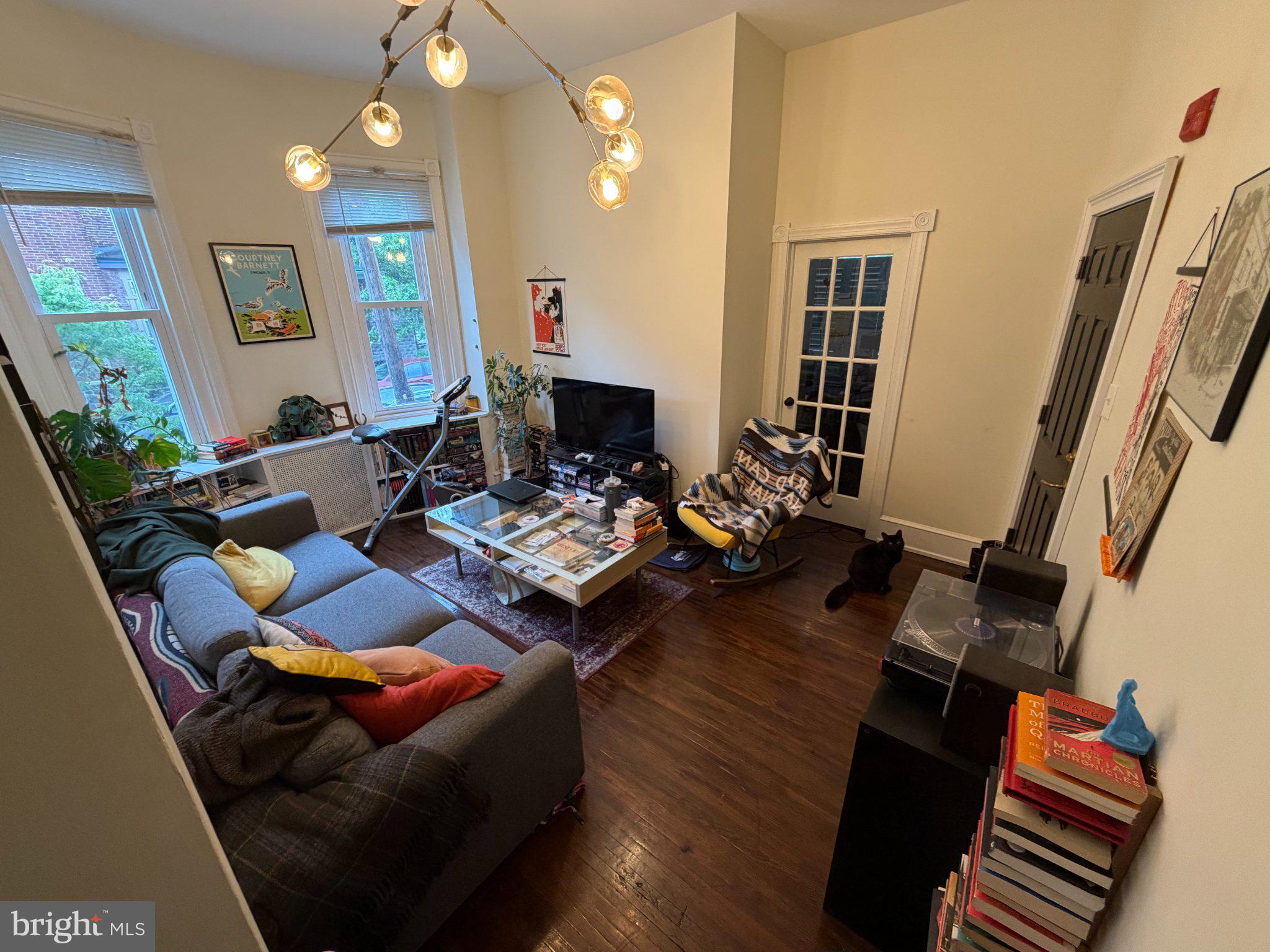 815 South 49th Street Philadelphia, PA 19143 - Photo 8 of 72 a living room with furniture and wooden floor