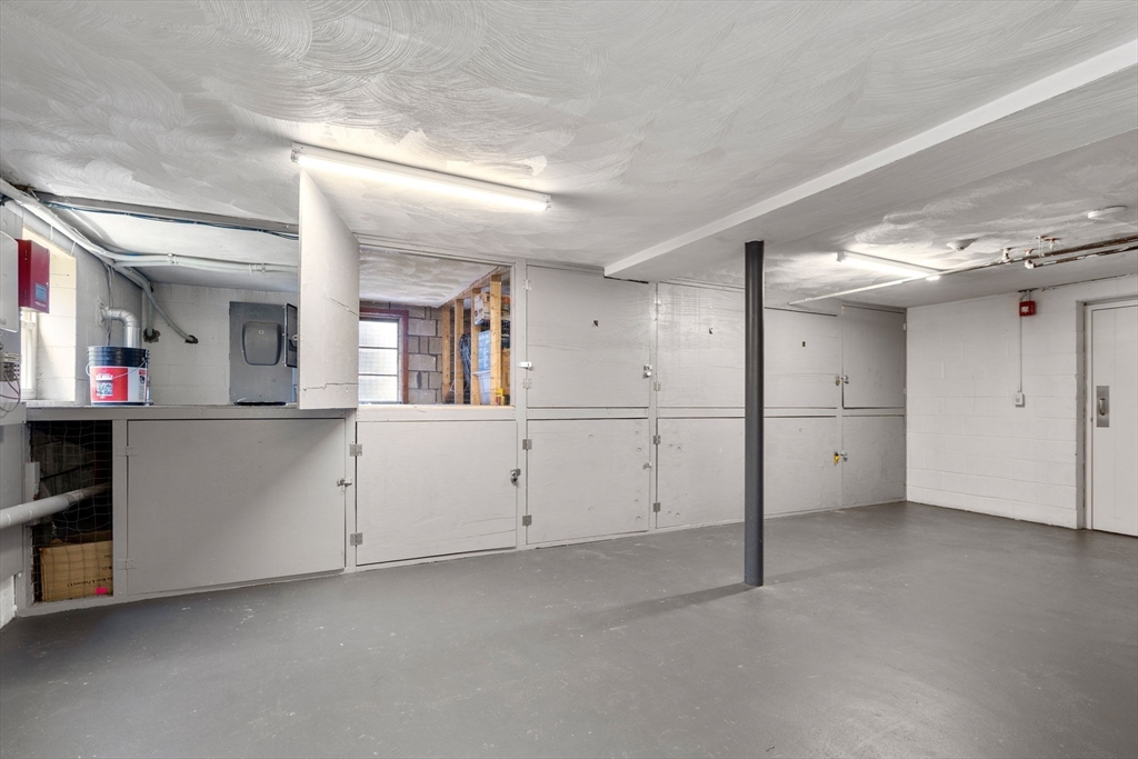 1105 Lexington Street, Unit 41 Waltham, MA 02452 - Photo 13 of 19 a view of a big room with closet and cabinet