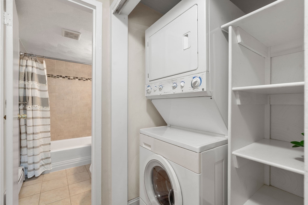 1105 Lexington Street, Unit 41 Waltham, MA 02452 - Photo 10 of 19 a view of washer and dryer