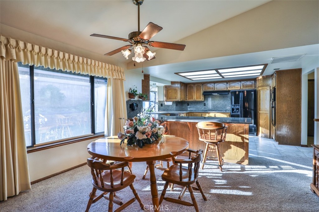 5848 Burlwood Court Rancho Cucamonga, CA 91701 - Photo 39 of 71 a view of a dining room with furniture window and outside view