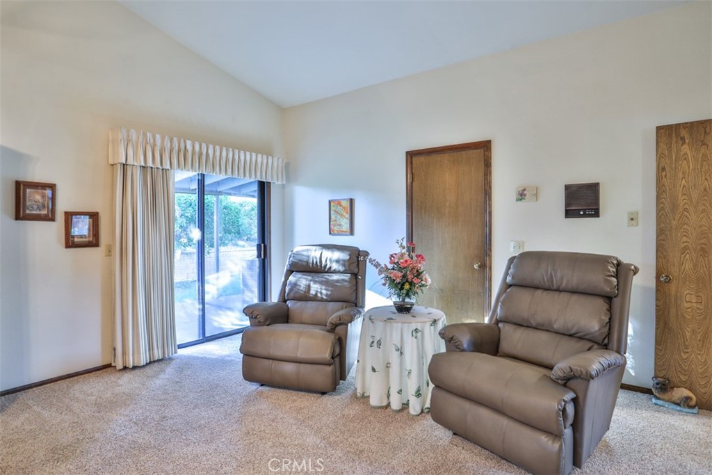 5848 Burlwood Court Rancho Cucamonga, CA 91701 - Photo 49 of 71 a living room with furniture and a window