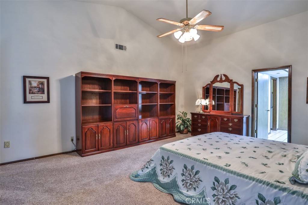 5848 Burlwood Court Rancho Cucamonga, CA 91701 - Photo 51 of 71 a bed room with a bed and a television