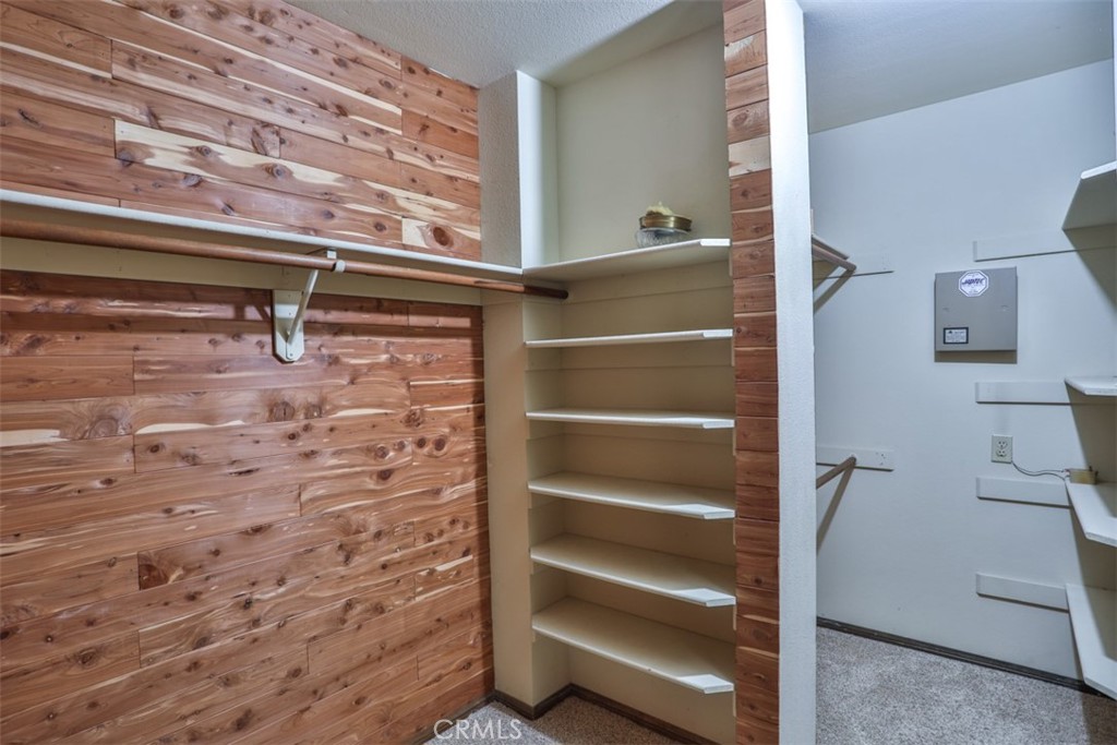 5848 Burlwood Court Rancho Cucamonga, CA 91701 - Photo 57 of 71 a view of walk in closet with empty racks