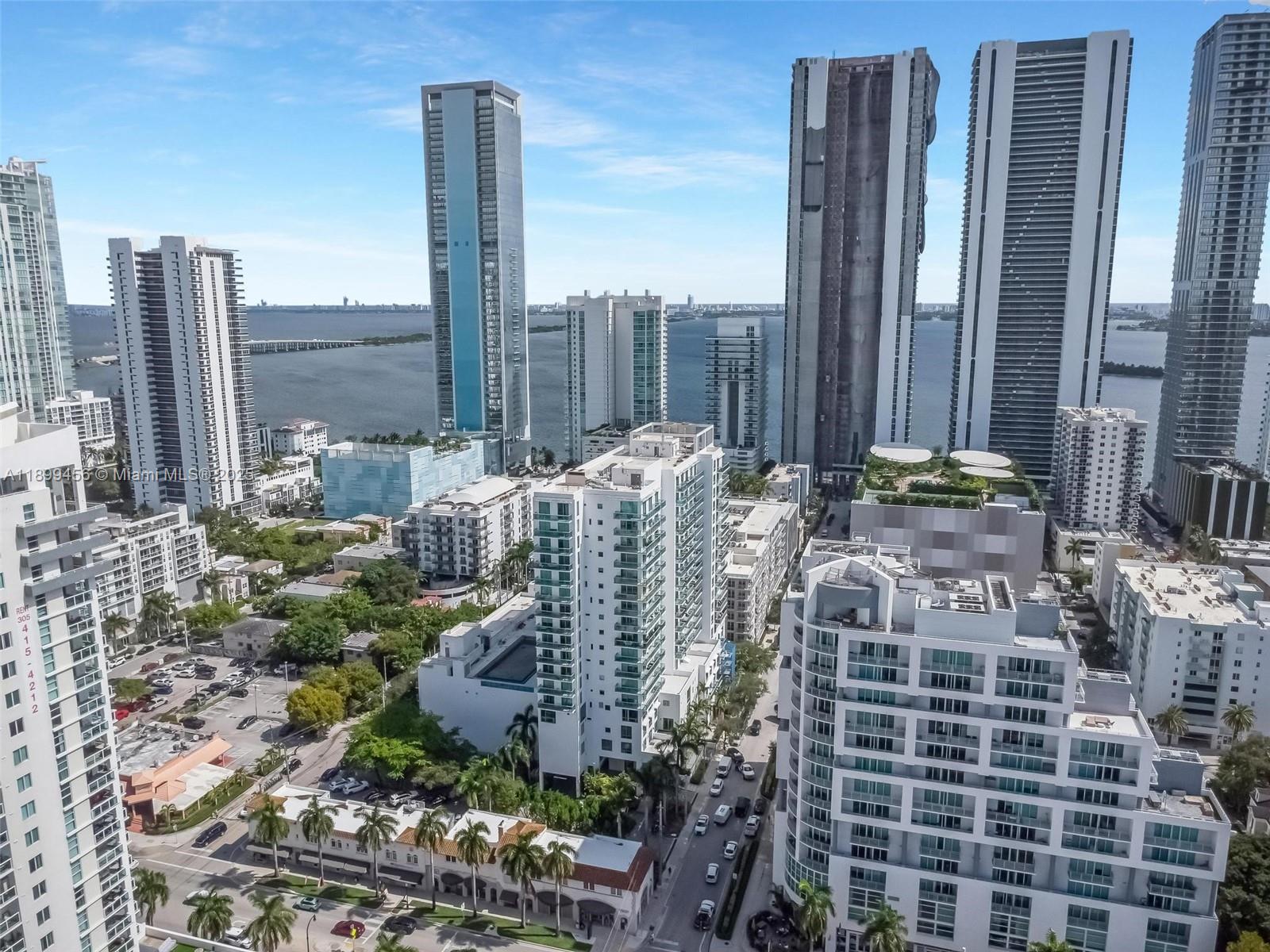 333 Northeast 24th Street, Unit 812 Miami, FL 33137 - Photo 30 of 32 a roof deck with tall buildings