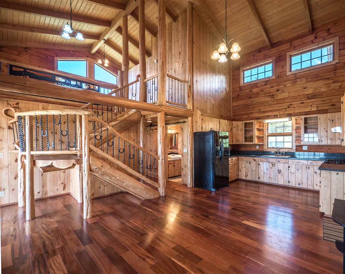 600 Calasa Road Kula, HI 96790 - Photo 11 of 30 a view of entryway and hall with wooden floor
