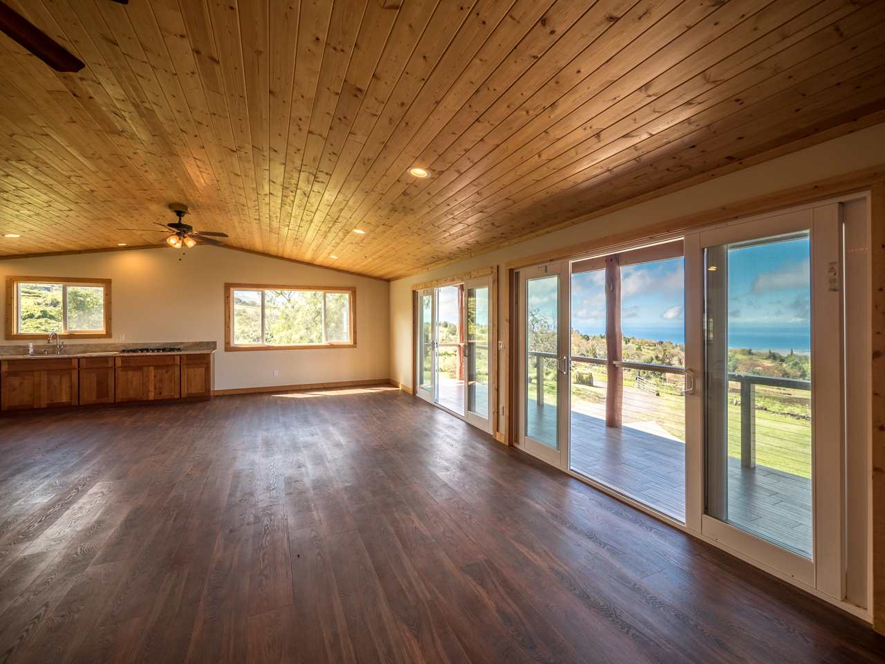 600 Calasa Road Kula, HI 96790 - Photo 23 of 30 a view of an empty room with a window and wooden floor