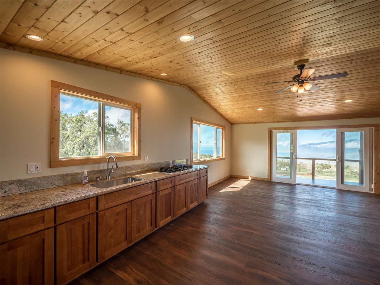 600 Calasa Road Kula, HI 96790 - Photo 24 of 30 a view of an empty room with window and wooden floor
