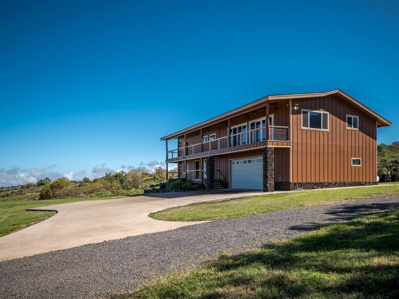 600 Calasa Road Kula, HI 96790 - Photo 27 of 30 a front view of a house with a yard