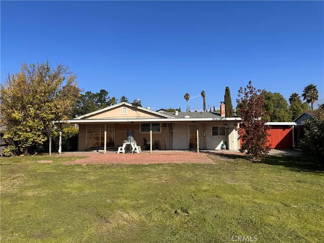 a view of a house with patio