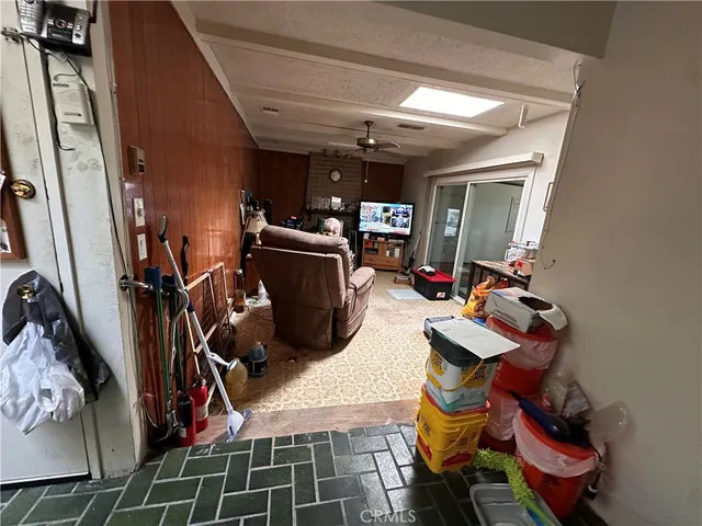 a room with gym equipment and mirror