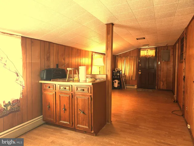 a view of a bathroom with a sink and a window