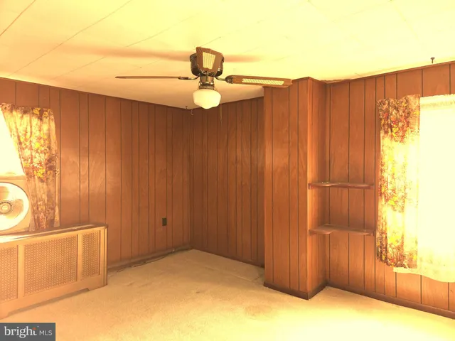 a view of a garage with wooden floor