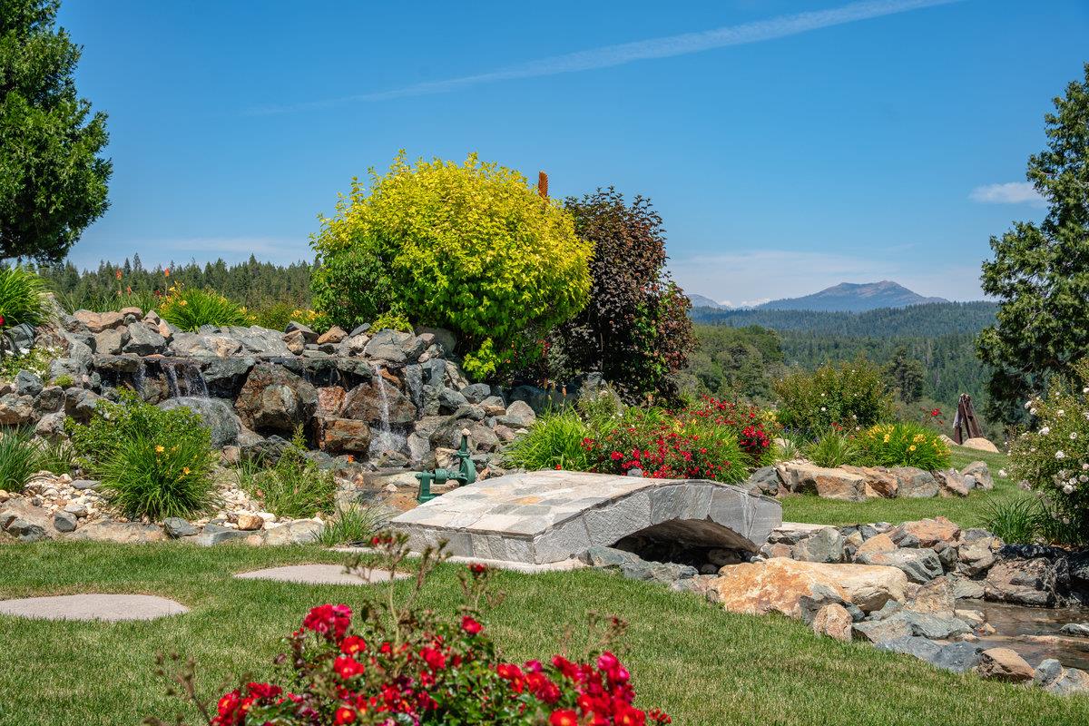 39110 Kearsarge Mill Road Alta, CA 95715 - Photo 14 of 99 a view of a lake with a mountain in the background