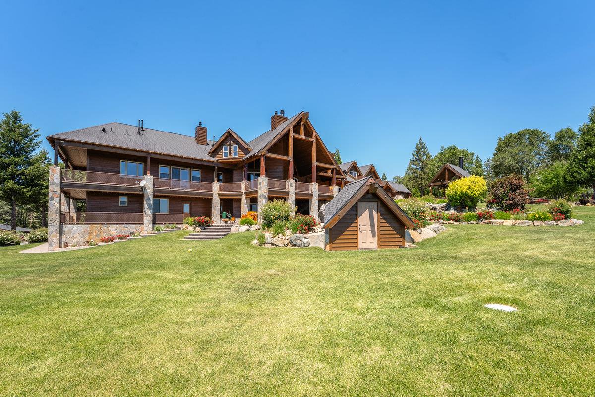 39110 Kearsarge Mill Road Alta, CA 95715 - Photo 25 of 99 a view of a house with a big yard and large trees