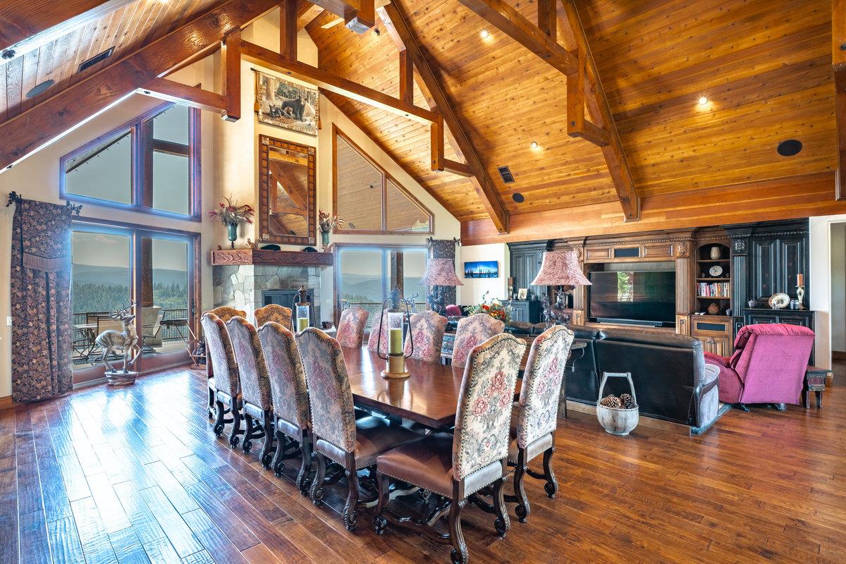 39110 Kearsarge Mill Road Alta, CA 95715 - Photo 29 of 99 a view of a dining room with furniture and wooden floor