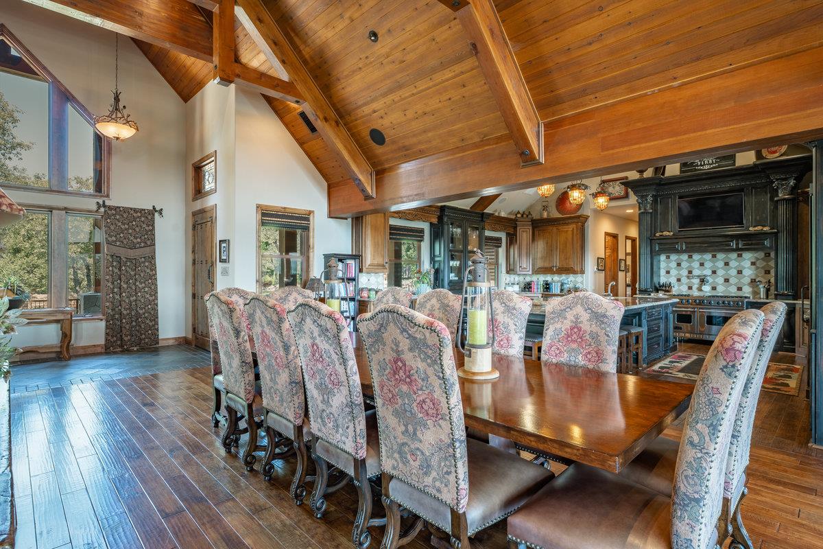 39110 Kearsarge Mill Road Alta, CA 95715 - Photo 30 of 99 a view of a dining room with furniture window and wooden floor