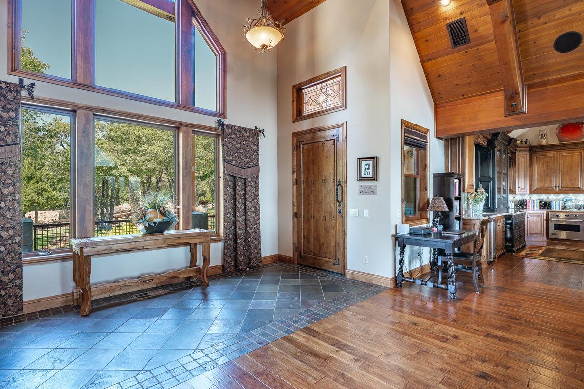 39110 Kearsarge Mill Road Alta, CA 95715 - Photo 45 of 99 a living room with furniture and large windows