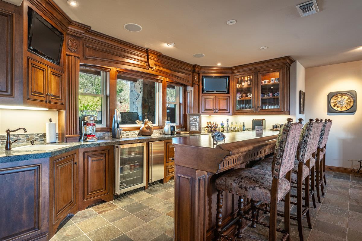 39110 Kearsarge Mill Road Alta, CA 95715 - Photo 48 of 99 a kitchen with a table and chairs in it