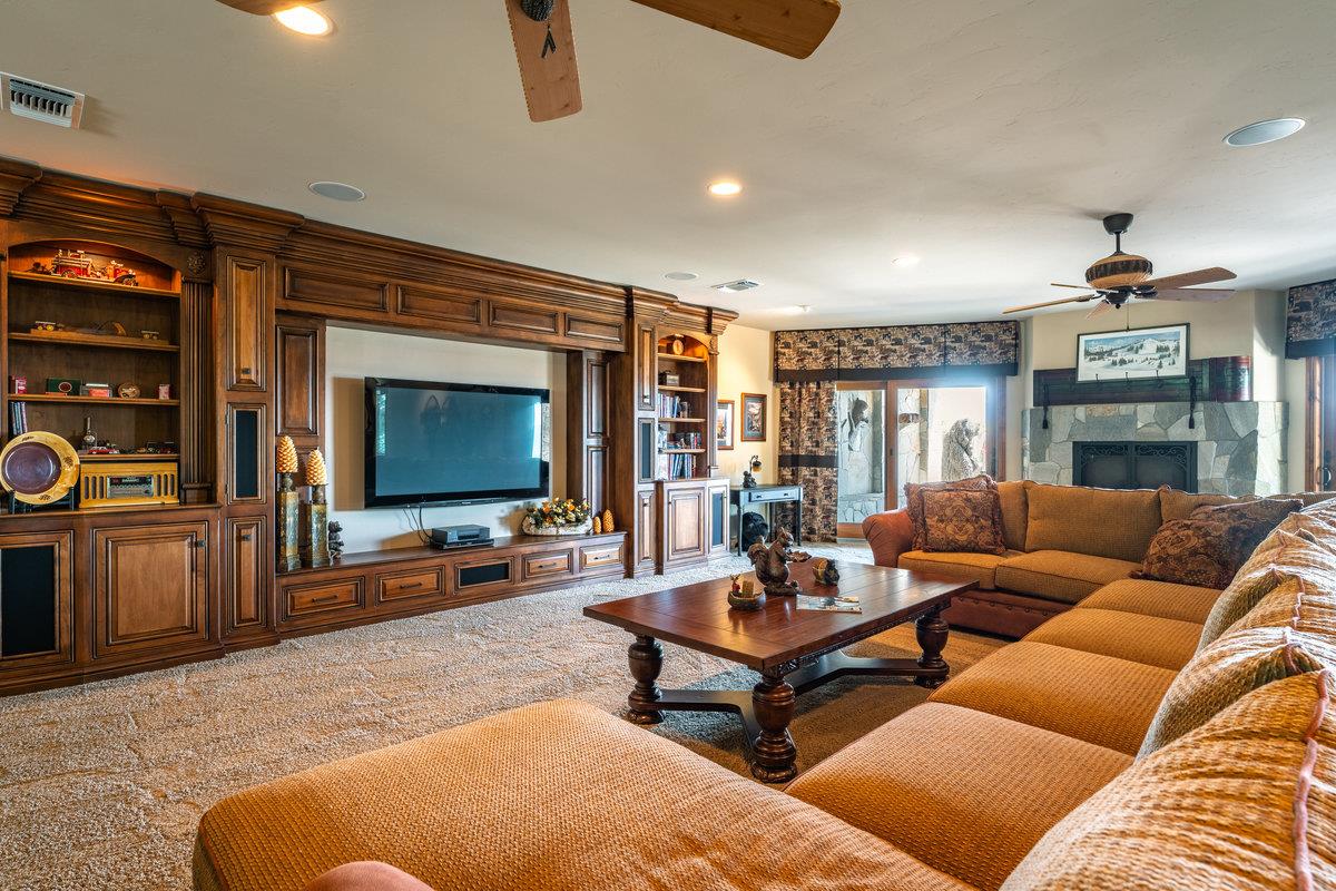 39110 Kearsarge Mill Road Alta, CA 95715 - Photo 51 of 99 a living room with furniture and a flat screen tv