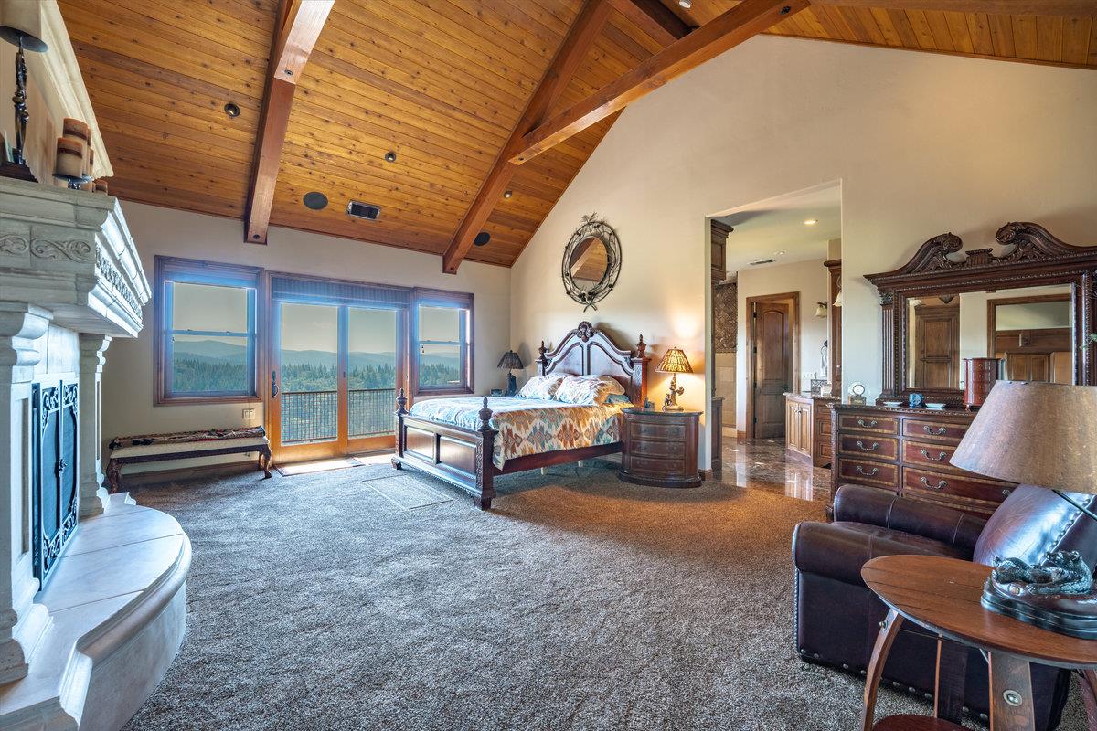 39110 Kearsarge Mill Road Alta, CA 95715 - Photo 53 of 99 a living room with furniture gym equipment and a large window