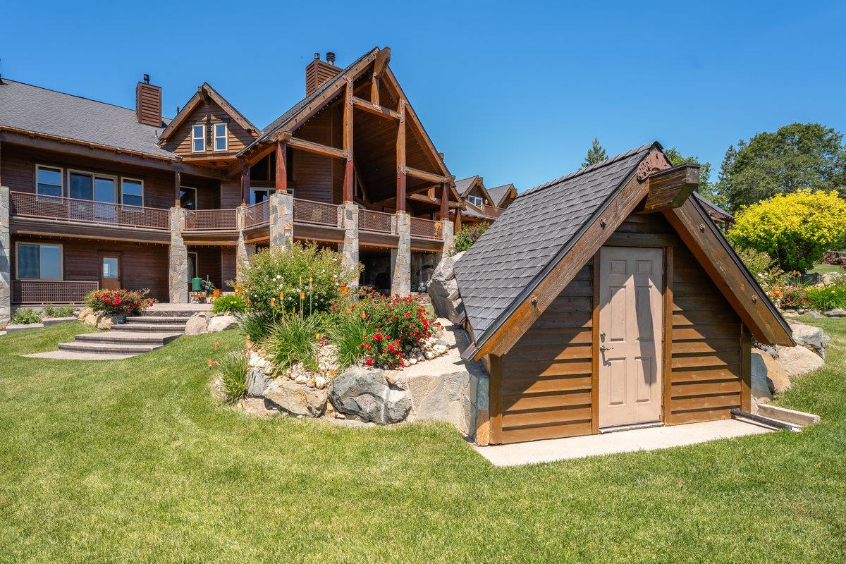 39110 Kearsarge Mill Road Alta, CA 95715 - Photo 70 of 99 a front view of a house with a yard table and chairs