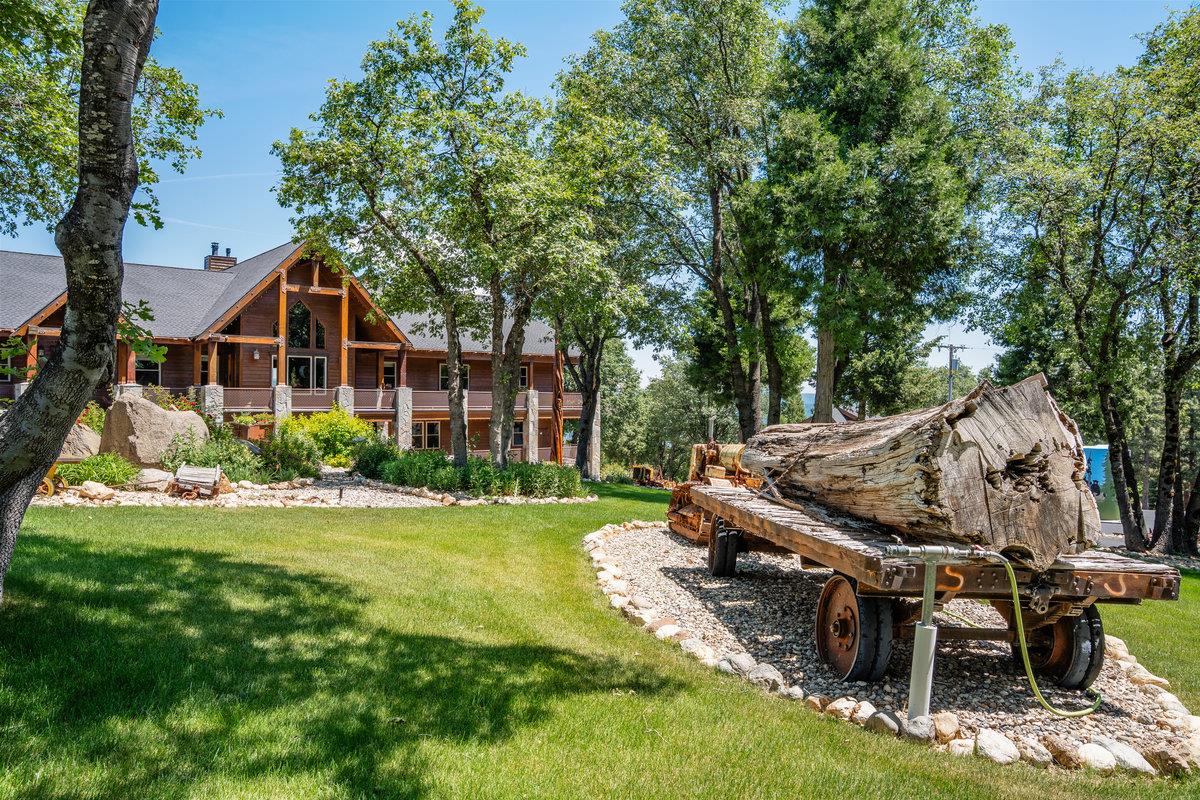 39110 Kearsarge Mill Road Alta, CA 95715 - Photo 90 of 99 a view of a wooden chairs and table in the garden