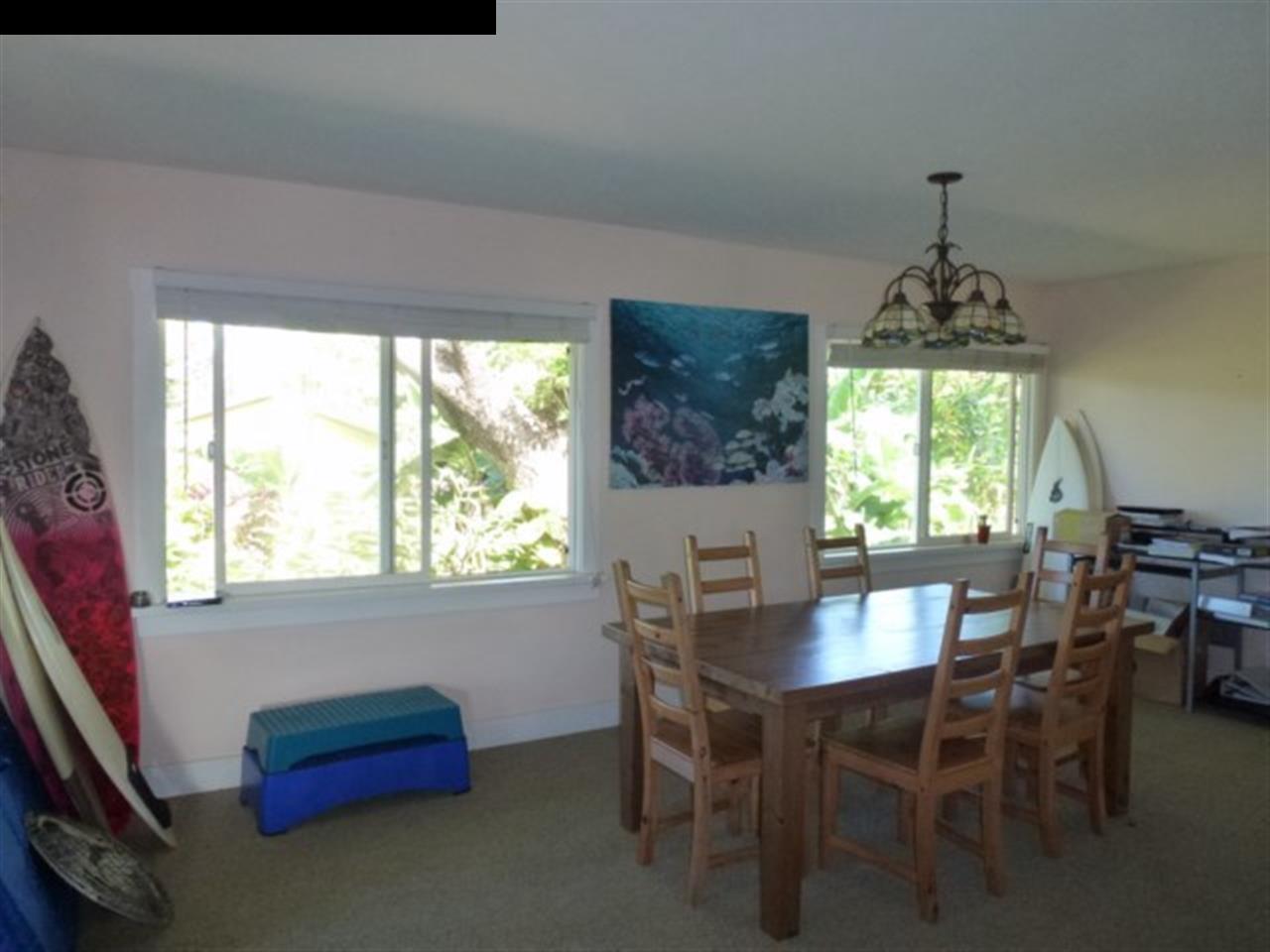 1220 West Kuiaha Road, Unit B1 Haiku, HI 96708 - Photo 13 of 29 a dining room with furniture window and outside view