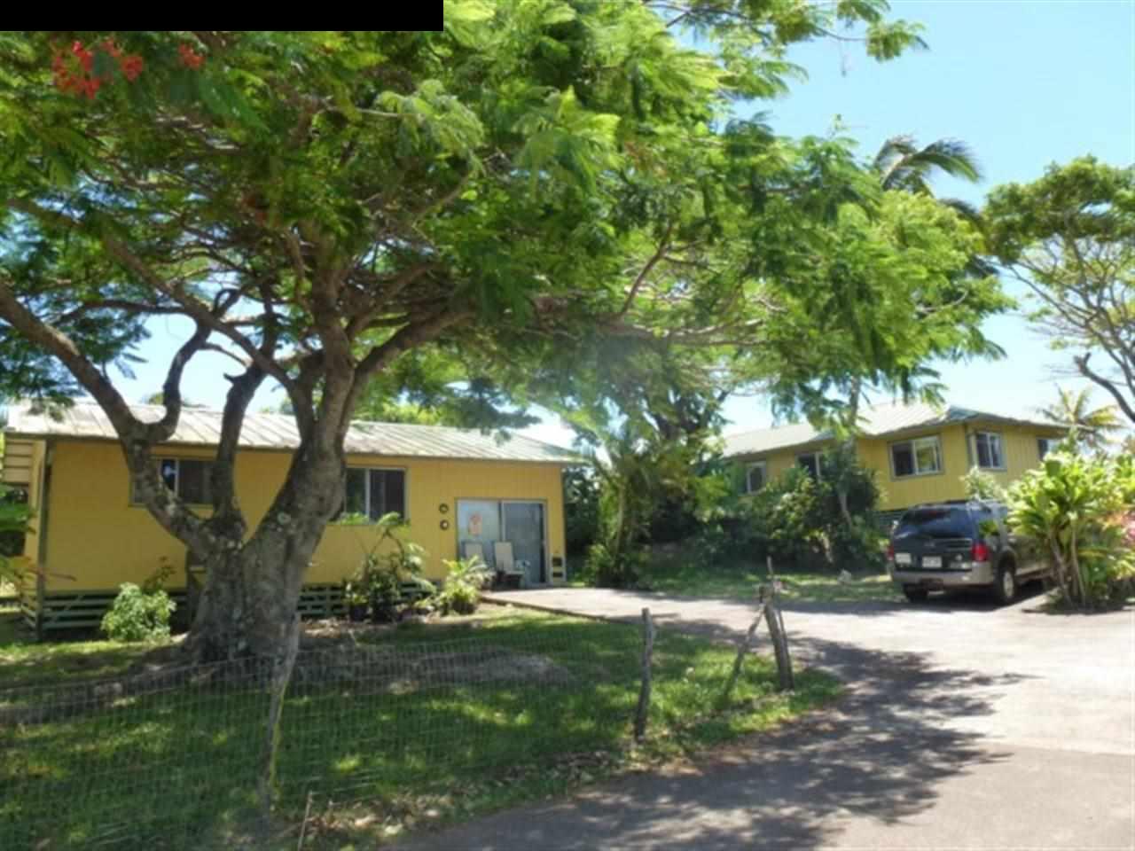 1220 West Kuiaha Road, Unit B1 Haiku, HI 96708 - Photo 19 of 29 a view of a house with a yard and tree s