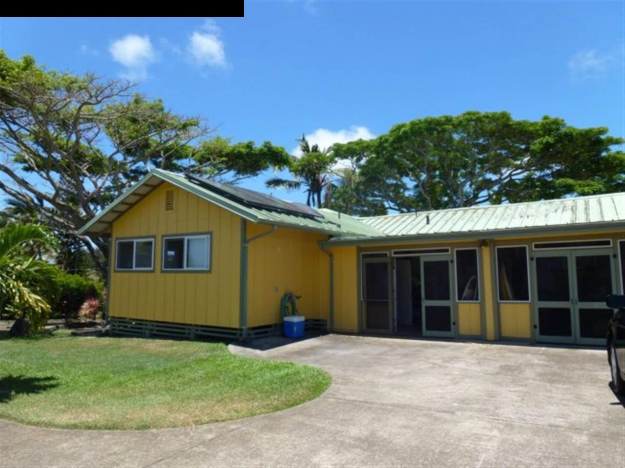1220 West Kuiaha Road, Unit B1 Haiku, HI 96708 - Photo 5 of 29 a house view with a garden space