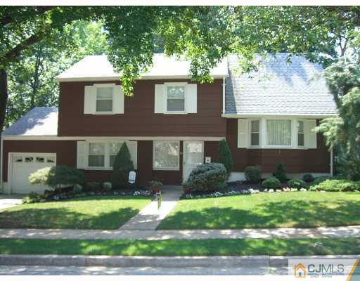 32 Phillips Road Edison, NJ 08817 - Photo 1 of 8 a front view of a house with a yard