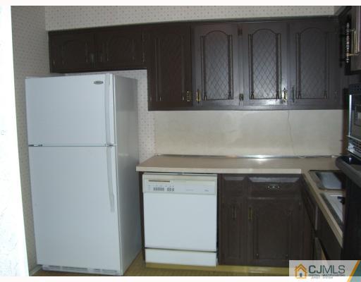 32 Phillips Road Edison, NJ 08817 - Photo 5 of 8 a close view of a refrigerator in kitchen
