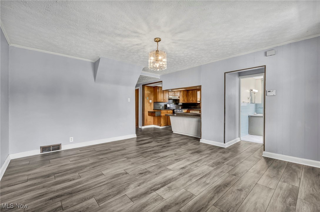 3207 6th Street Southwest Canton, OH 44708 - Photo 15 of 50 Dining room with view of full bathroom and large open kitchen