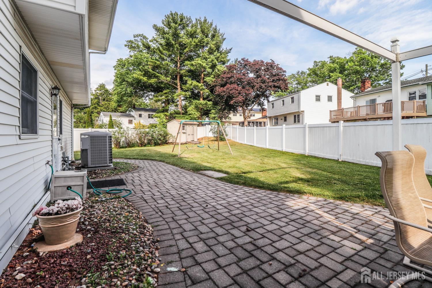 5 Timothy Court Edison, NJ 08837 - Photo 28 of 32 a view of a backyard with sitting area