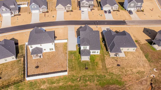 with aerial view of residential houses with outdoor space