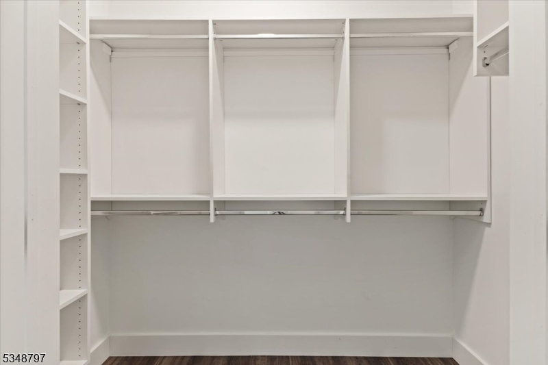 450 Springfield Avenue, Unit 301 Berkeley Heights, NJ 07922 - Photo 12 of 26 a view of an empty walk in closet