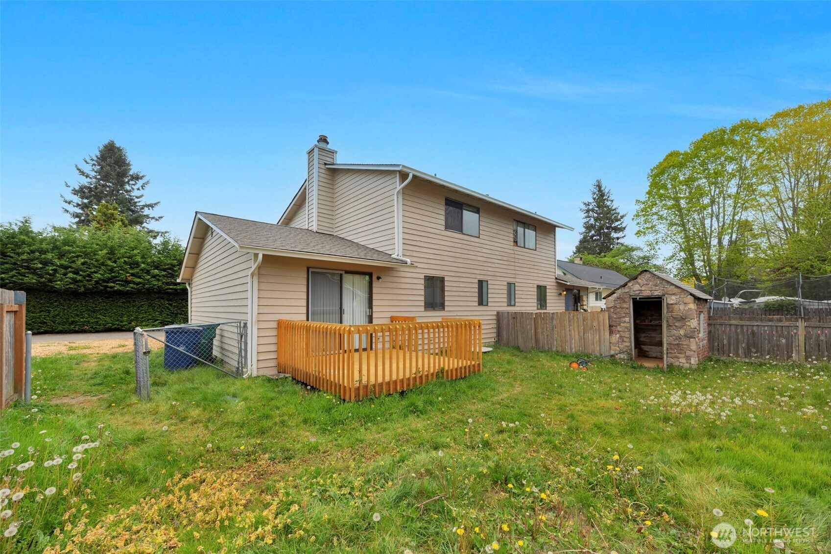 6920 Armar Road Marysville, WA 98270 - Photo 1 of 24 a view of a house with a yard and sitting area