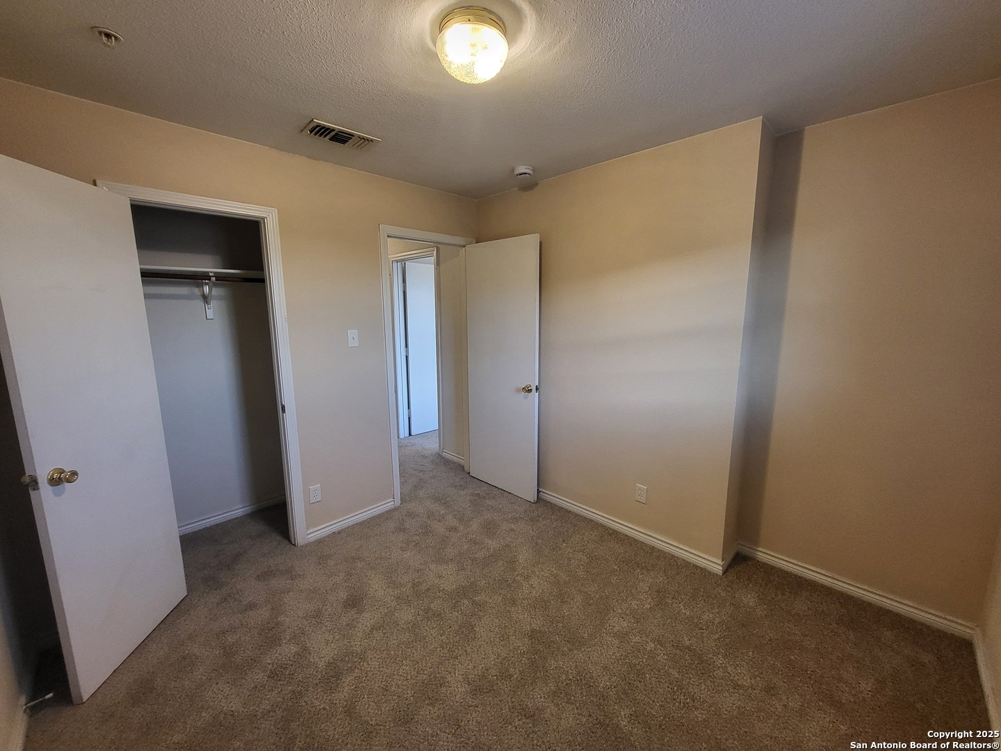 10006 Vasso View, Unit 4 Converse, TX 78109 - Photo 13 of 15 a view of an empty room
