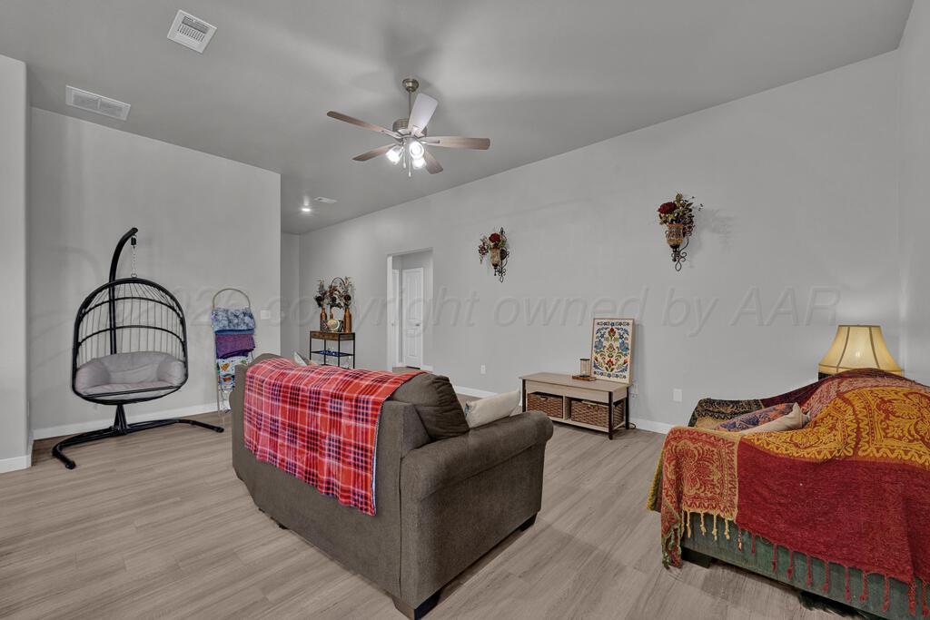 7210 Hart Road Amarillo, TX 79118 - Photo 7 of 24 living room 2