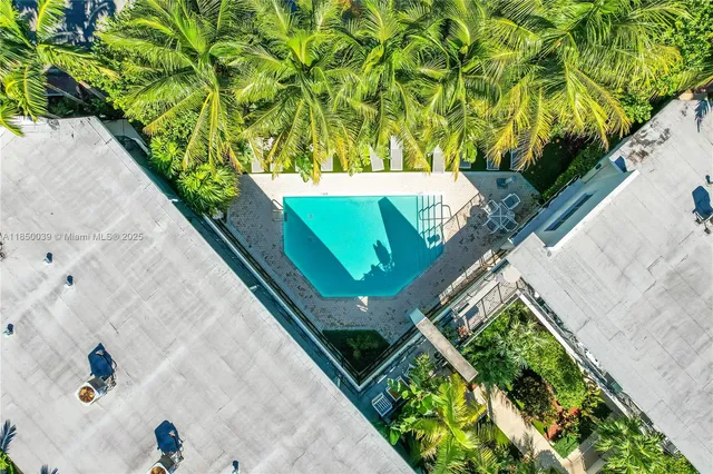 a view of swimming pool with a yard
